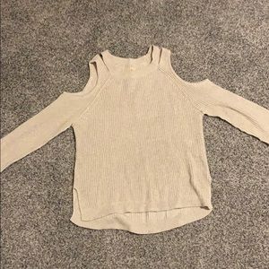 Cream sweater with shoulder cutouts